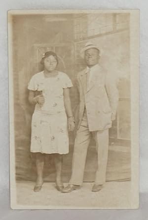 [Postcard with African American man and woman]