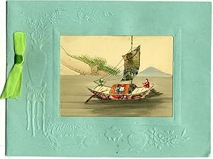 Chinese embossed Christmas card, with cut stamp montage on a watercolor landscape