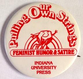 Pulling our own strings: feminist humor & satire [pinback button]