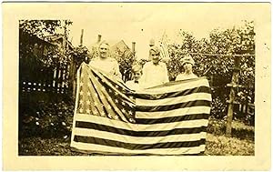 Family Holding Flag