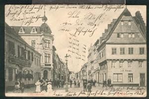 Ansichtskarte: Strasse in Köln, rechts ein Geschäftshaus von J. F. Moons. 0, s/w, I-II, 1908.