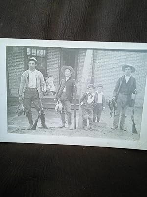 Vintage photograph of duck hunters and game