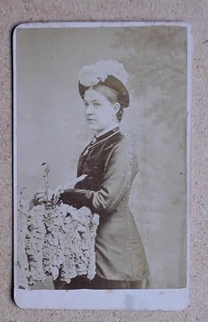 Carte De Visite Photograph: Studio Portrait of a. Young Woman & Feather Hat.