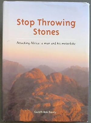 Stop Throwing Stones - Attacking Africa : a man and his motorbike