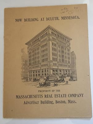 Now Building at Duluth, Minnesota. Property of the Massachusetts Real Estate Company Advertiser B...