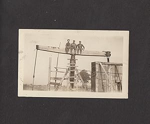 Photograph album documenting two itinerant roughnecks' travel through New York, Pennsylvania, and...