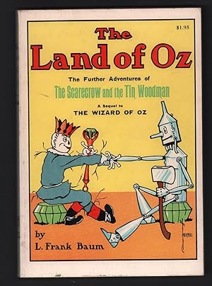 The Land of Oz: being an account of the further adventures of the Scarecrow and Tin Woodman and a...