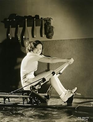 Maureen O'Sullivan doing her exercises at the gym studios MGM Photo 1932