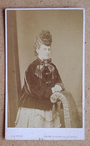 Carte De Visite Photograph. Studio Portrait of a Young Woman in a Fine Coat & Bonnet.