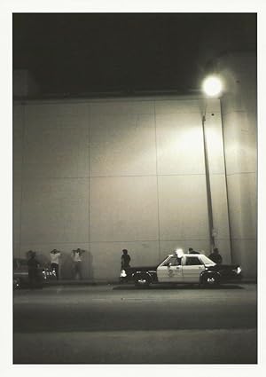 Mike Figgis : Los Angeles Police Department (LAPD) officers arresting suspects, Los Angeles, 1990...