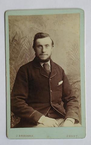 Carte De Visite Photograph. A Studio Portrait of a Young Bearded Man.