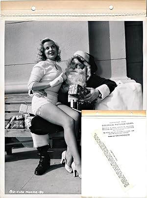 Cleo Moore on Santa's knee (Original publicity photograph)
