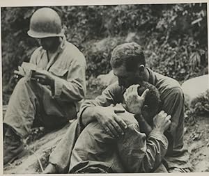 Korea, An American Infantryman morning his buddy killed in action