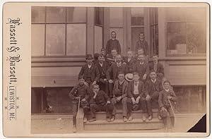 Lewiston, Me. Boys and Men Posing on Storefront cabinet card