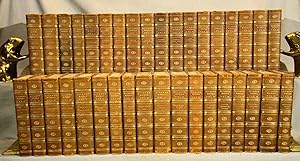 The Works of Charles Dickens 34 volumes in three-quarter polished calf gilt by Riviere & Son plus...