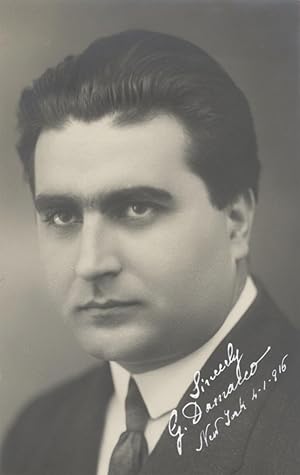 Bust-length postcard photograph of the Italian tenor. Signed "G. Damacco" and dated "New York 4-1...