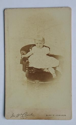 Carte De Visite: Portrait of a Young Child Seated on a Chair.