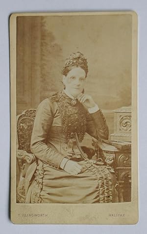 Carte De Visite Photograph. A Studio Portrait of a Woman Wearing a Fine Dress.