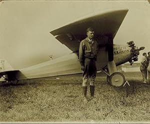 Original photograph of Charles Lindbergh next to the Spirit of St. Louis. Signed.