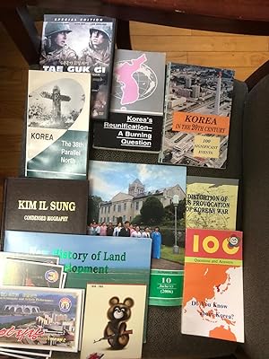 Set of 6 PROPOGANDA books and 2 magazines from NORTH KOREA and in addition a set of 8 postcards a...