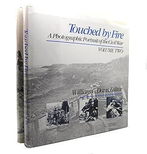 TOUCHED BY FIRE; A PHOTOGRAPHIC PORTRAIT OF THE CIVIL WAR Volume One and Volume Two