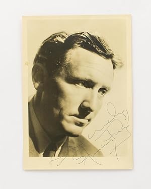 A portrait photograph inscribed and signed 'Sincerely, Spencer Tracy'