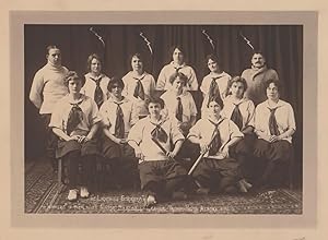The Lightning Strikers. Winners of the Ladies Indoor Baseball League Trophy, Nome, Alaska, 1914