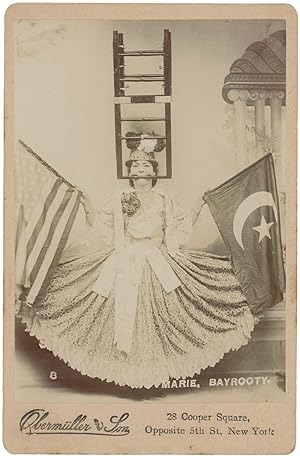 Cabinet Card of Marie Bayrooty in Stunt Pose Holding American and Turkish Flags, Circa 1905