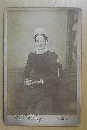 Cabinet Photograph: Portrait of a Seated Lady Holding a Book.