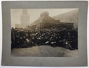 Lenin's Wooden Mausoleum with a Group of People in the Front