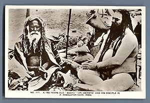 India, A 150 years old "Sadhu" (Ascetic), and his disciple in a Himalayan Cave