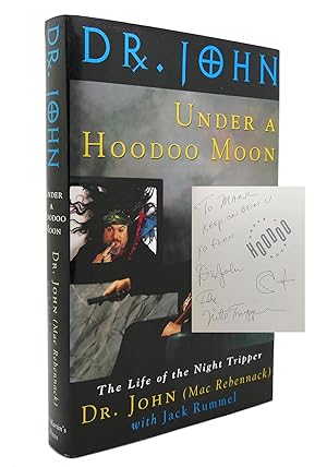 UNDER A HOODOO MOON SIGNED the Life of Dr. John the Night Tripper
