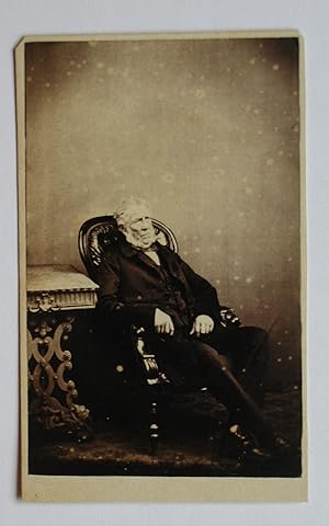 Carte De Visite Photograph: A Studio Portrait of a Seated Elderly Gentleman.