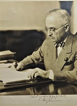 A large, signed photographic portrait of President Harry S. Truman inscribed to one of his Second...