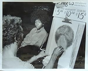 July 23-24, 1972 Press Photograph of a teenage African-American girl sitting for an African-Ameri...