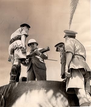 An original wartime press photograph from The Chicago Tribune archive capturing Prime Minister Wi...