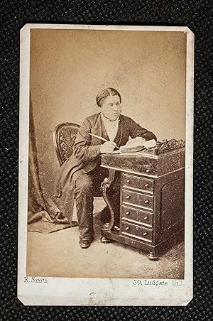 Original photograph or Carte de Viste of C.H. Spurgeon seated at his desk