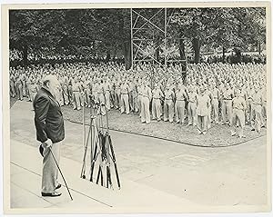 An original wartime press photograph of Prime Minister Winston S. Churchill addressing U.S. Naval...