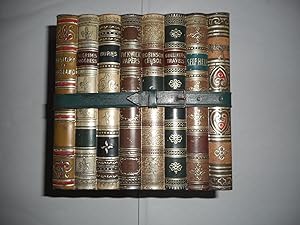A Tin Bicuit Box Shaped As Eight Classic Novels Tied With A Strap This ' Library ' = Gulliver's T...