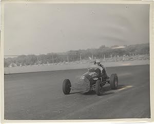 Archive of 14 vernacular photographs of open wheel races at the Iowa State Fair, circa 1950s