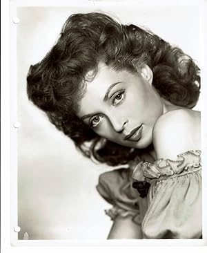 A VINTAGE PUBLICITY PHOTOGRAPH by SCOTTY WELBORNE of the young Hollywood Movie Star LILLI PALMER.