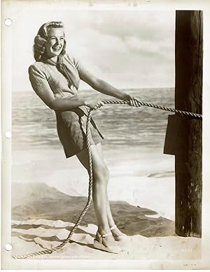 A VINTAGE PUBLICITY PHOTOGRAPH of the Hollywood Movie Star JUNE ALLYSON attired in fashionable sh...
