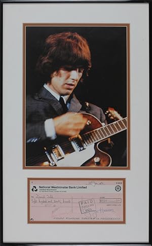 George Harrison Signed Check Nicely Framed with his Photograph