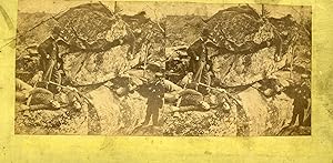 Stereoview of Devil's Den at Gettysburg with Sharpshooters with Rifles