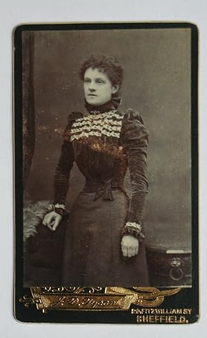Carte De Visite Photograph: Portrait of a Finely Dressed Young Woman.