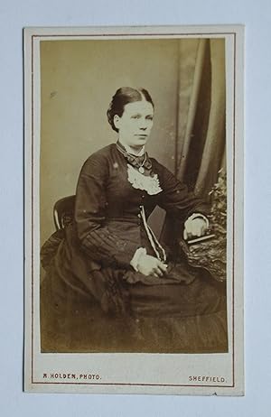 Carte De Visite Photograph. Portrait of a Seated, Finely Dressed Lady.