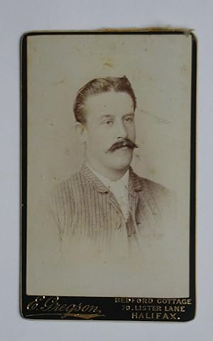 Carte De Visite Photograph. A Portrait of a Young Man with a Moustache.