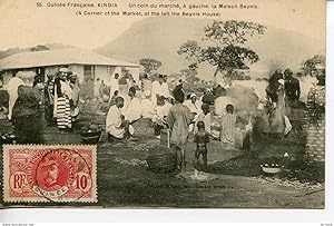 CPA GUINEE FRANCAISE. KINDIA. UN COIN DU MARCHE. A GAUCHE LA MAISON BEYNIS 1906