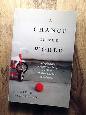 A CHANCE IN THE WORLD : An Orphan Boy, A Mysterious Past, and How He Found a Place Called Home