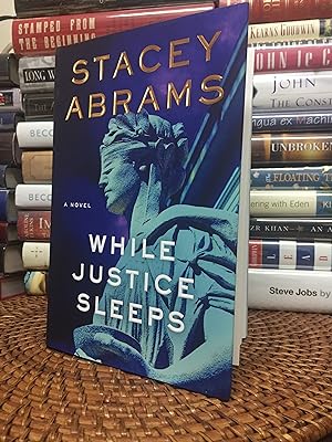 While Justice Sleeps (Signed first printing)
